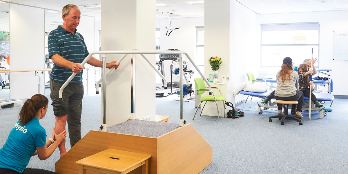 Clients working with physiotherapists in the neurological treatment space at Bridge4 Rehab